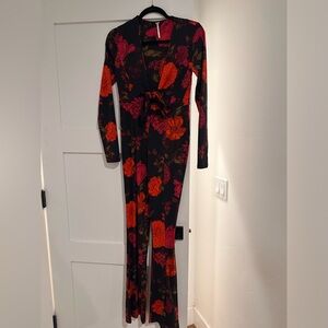 Red, pink, and black floral Free People Jumpsuit. XS